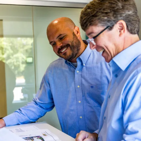 Crain Construction employees discussing development project